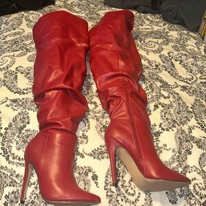 Beautiful Red “slouchy”thigh high, heeled boots.
Never worn
Side 1/2 zipper